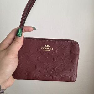Coach Wristlet Embossed burgendy